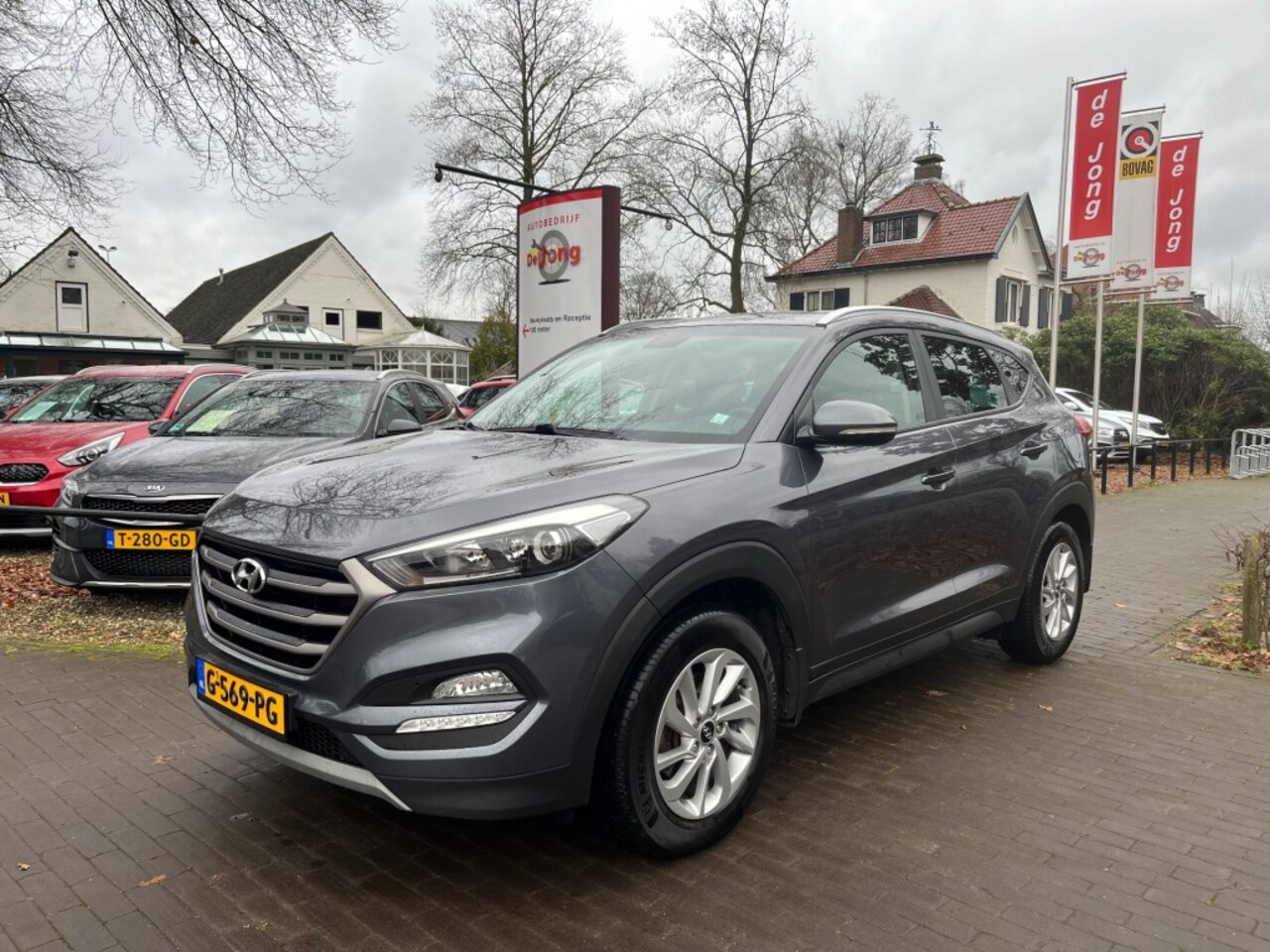 Hyundai Tucson - 1.6 GDI GO! / NAVI  / CAMERA / CARPLAY / TREKHAAK / STOELVERW. - AutoWereld.nl