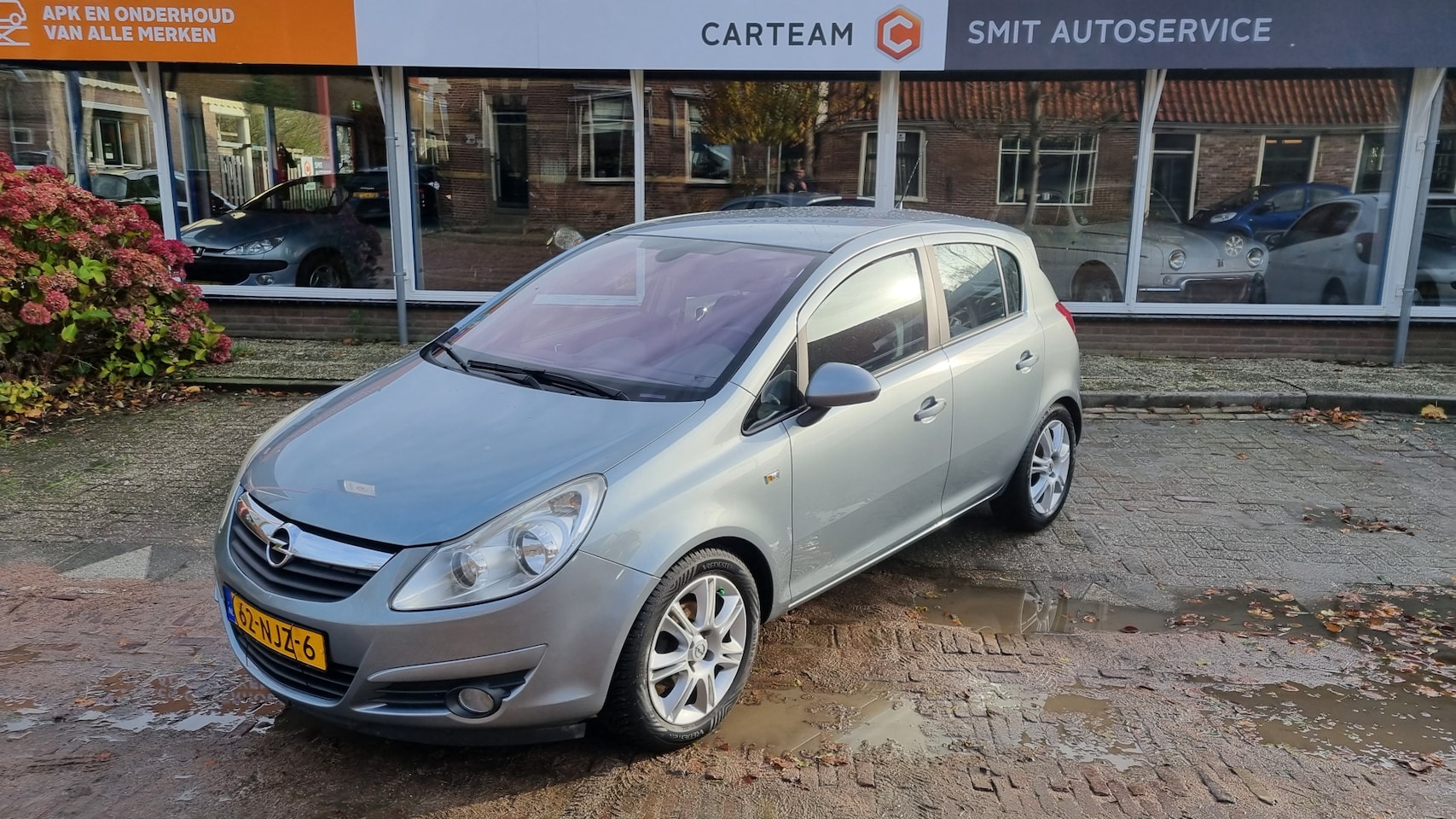 Opel Corsa - 1.4-16V Cosmo 5drs Climat control Lmv. Half leder - AutoWereld.nl