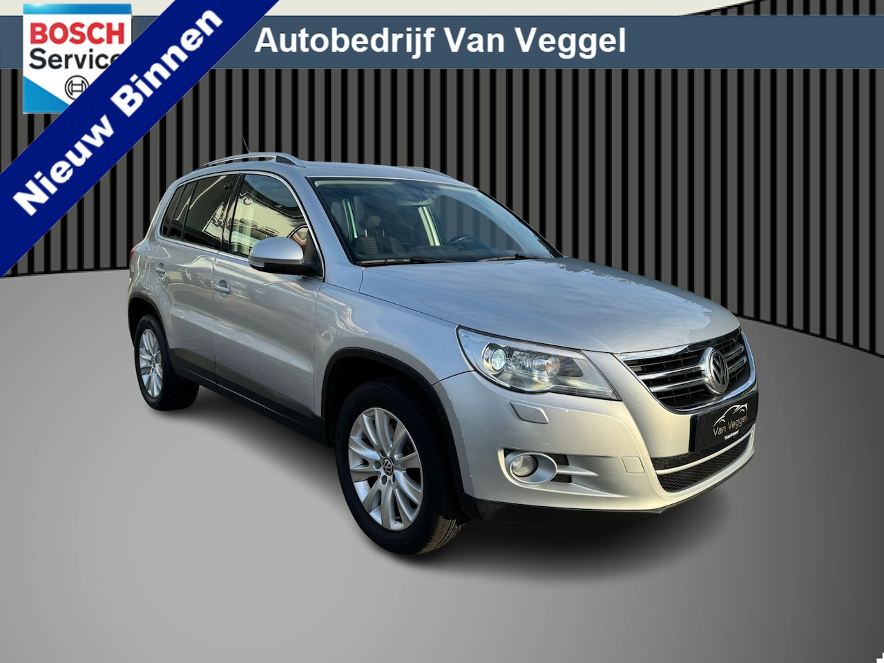 Volkswagen Tiguan - 2.0 TSI Sport&Style 4Motion navi, stoelverw, cruise, trekhaak - AutoWereld.nl