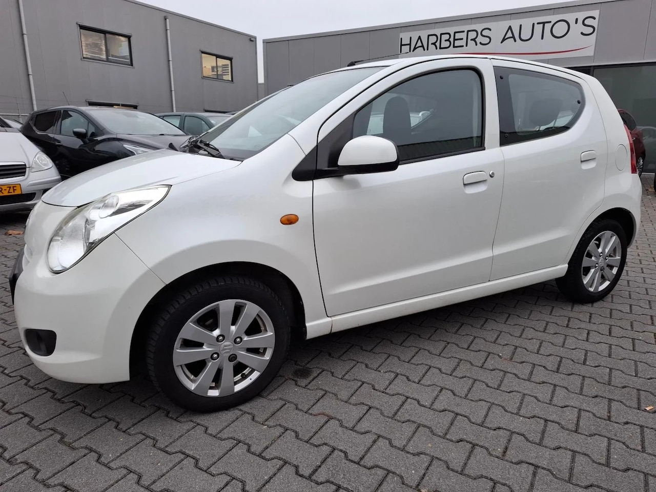 Suzuki Alto - 1.0 Exclusive AIRCO/5 DEURS/PARELMOER WIT! - AutoWereld.nl