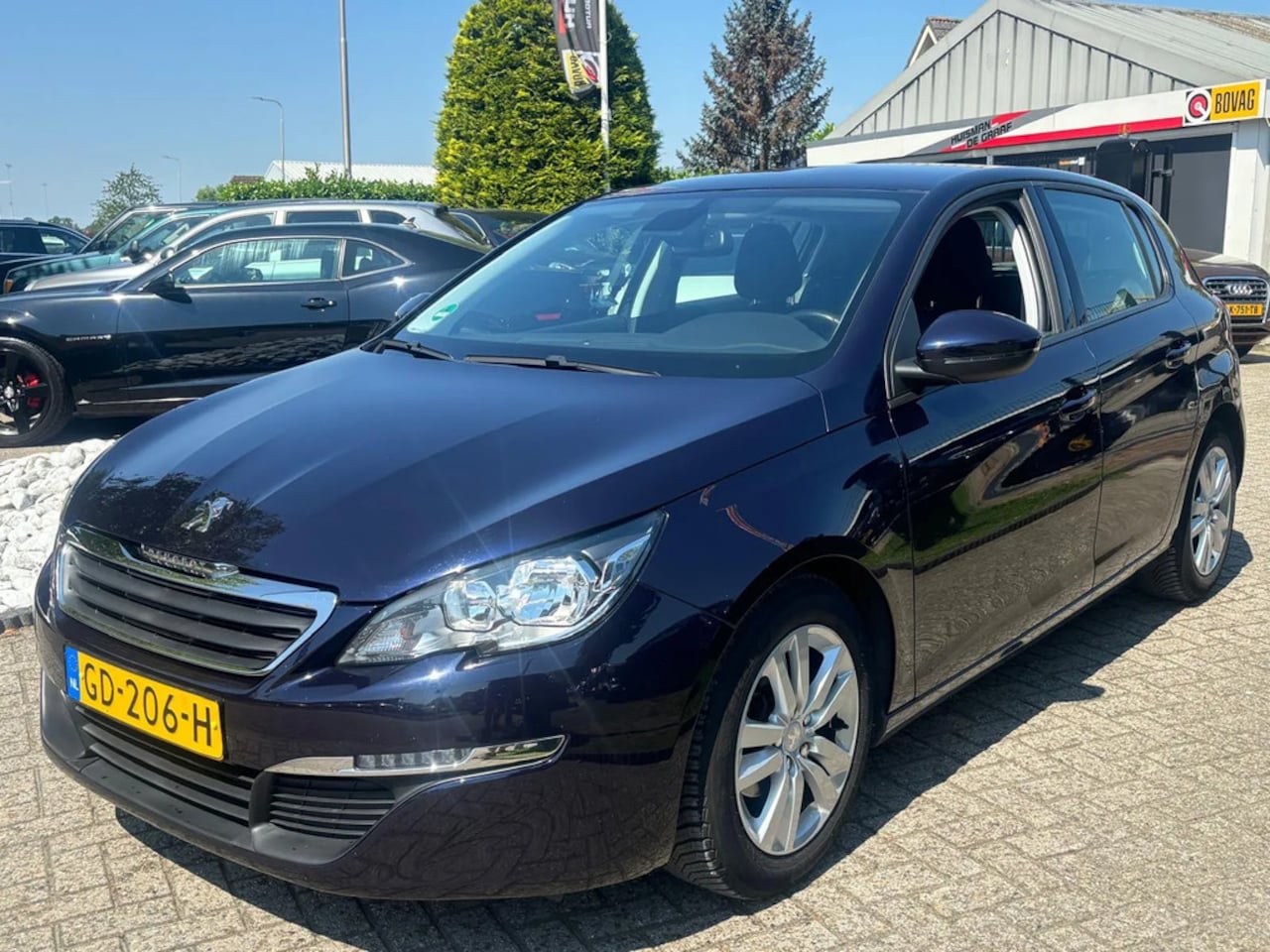 Peugeot 308 - 1.2 Benzine 5-Deurs Blauw 2015 135.000 KM - AutoWereld.nl