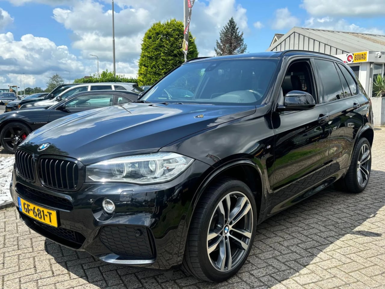 BMW X5 - 4.0D 2014 Zwart M-Pakket Panoramadak Black Edition - AutoWereld.nl