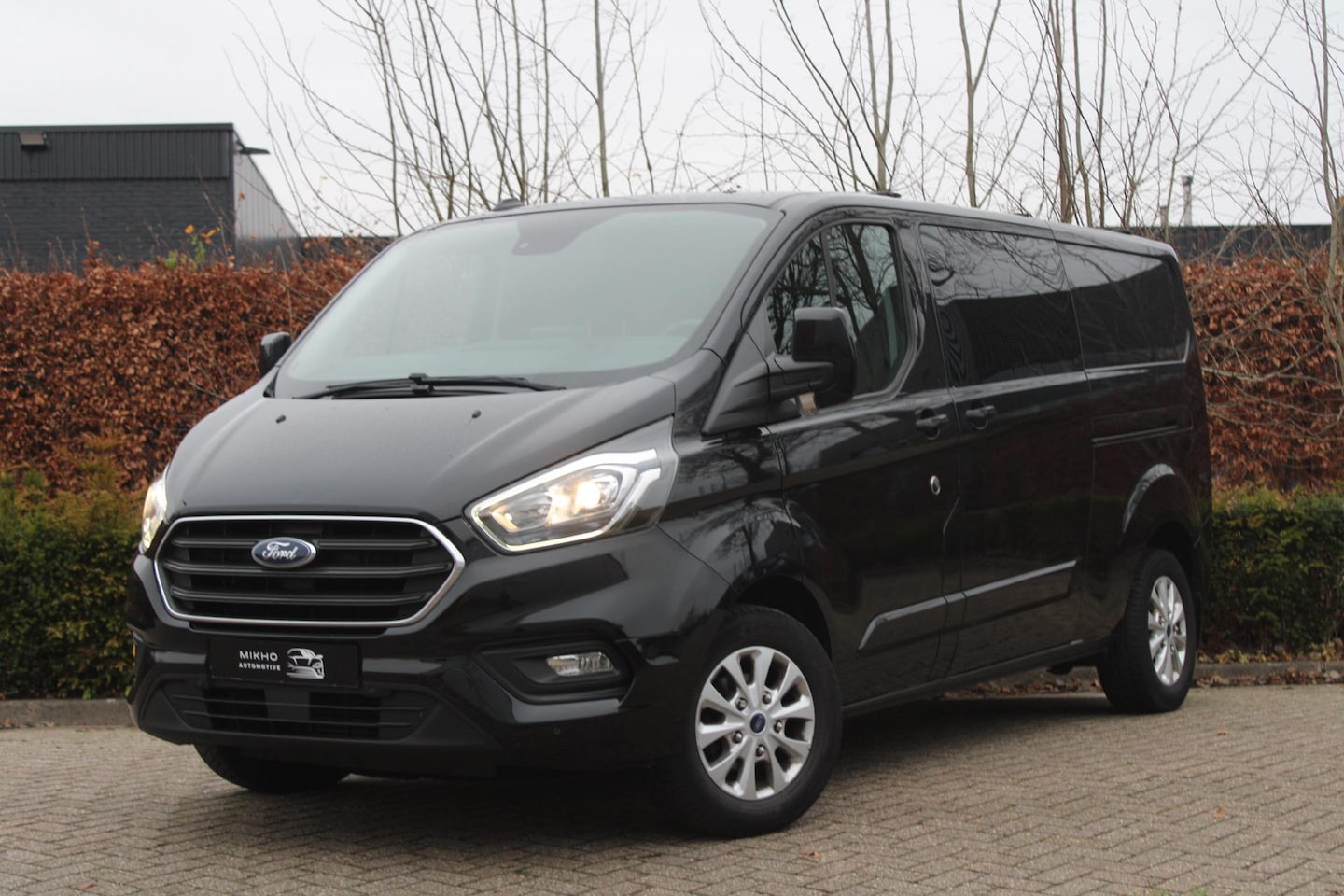 Ford Transit Custom - 300 2.0 TDCI L2H1 Limited | Automaat | Stoelverwarming | Camera | Cruise Control | 5 Zits - AutoWereld.nl