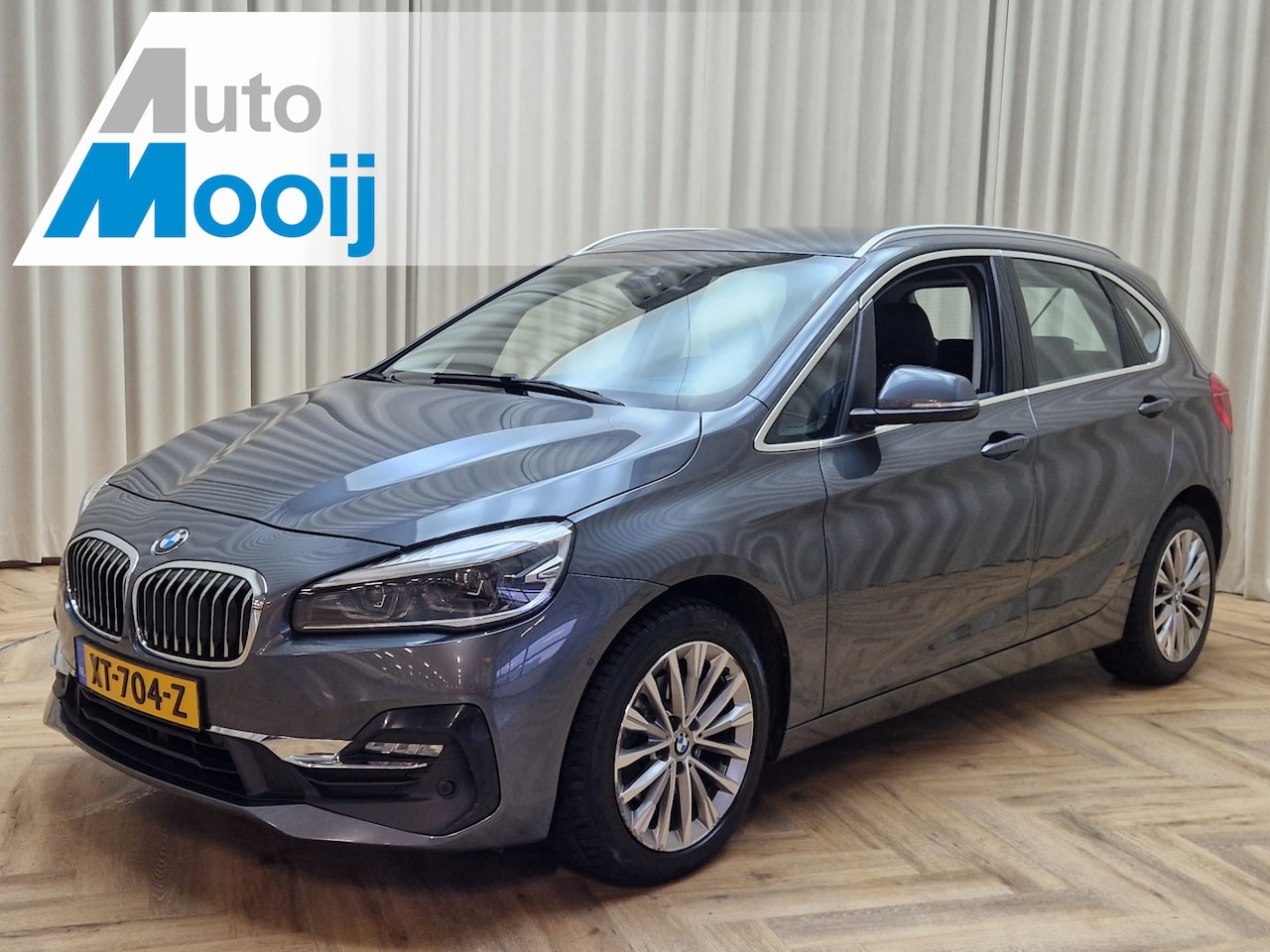 BMW 2-serie Active Tourer - 218i Executive Edition *Leder* Head-up / LED / Camera / Navigatie / Cruise Control / ECC C - AutoWereld.nl