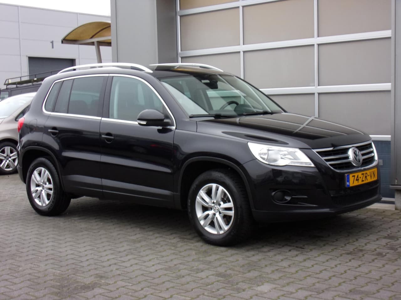 Volkswagen Tiguan - 1.4 TSI Sport&Style 4Motion Panodak/Leer/Clima/Cruise!! - AutoWereld.nl