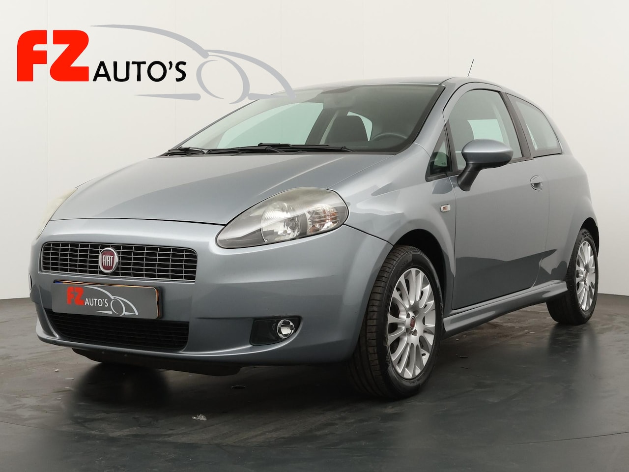 Fiat Grande Punto - 1.4 NeroBianco | Airco | L.M. velgen | 117.894 KM | - AutoWereld.nl