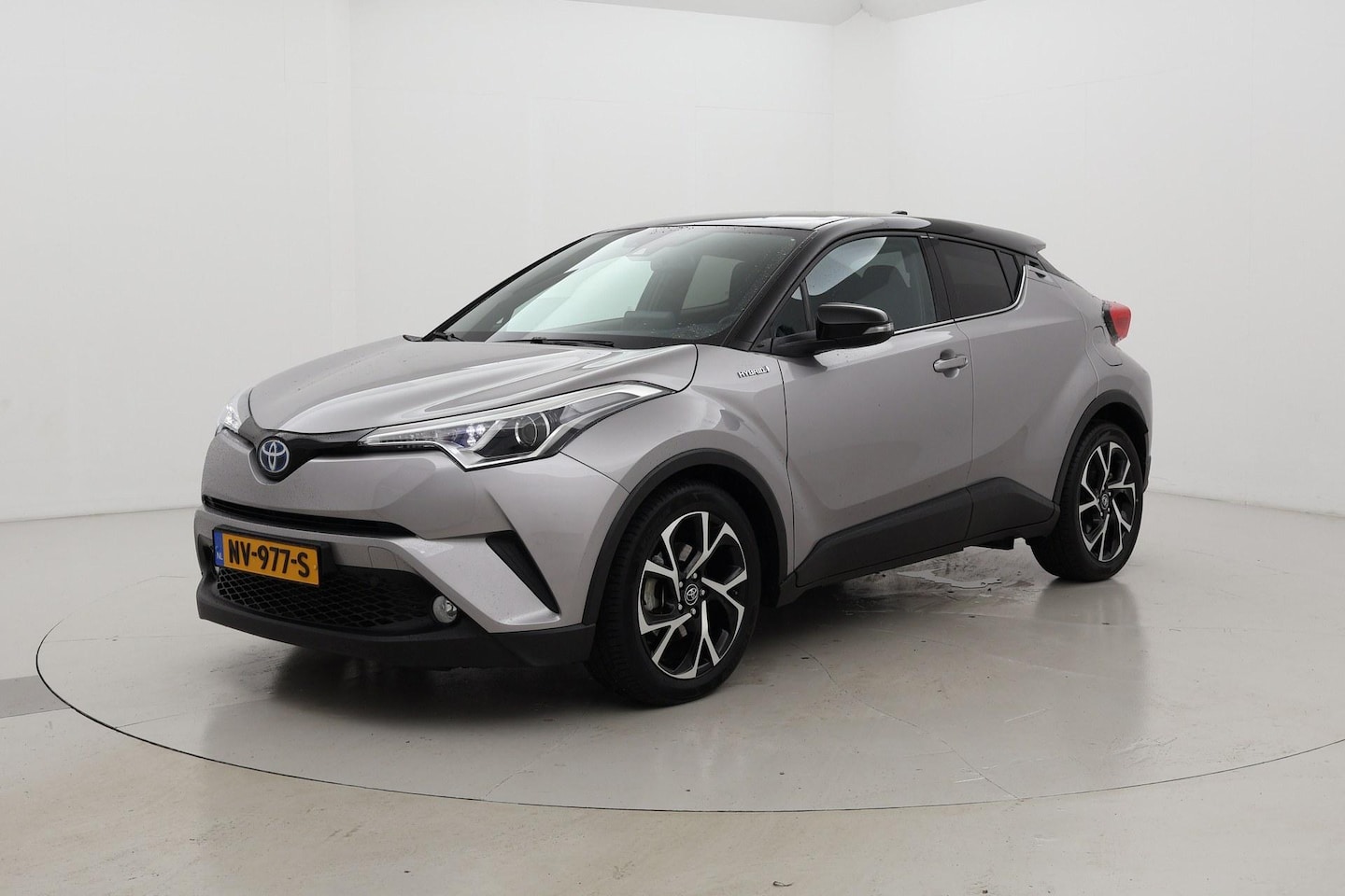 Toyota C-HR - 1.8 Hybrid Bi-Tone Navigatie - AutoWereld.nl