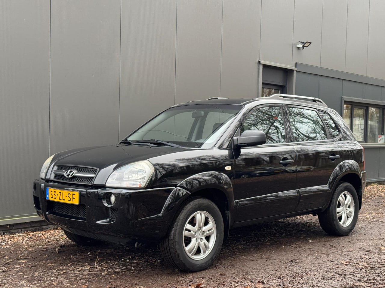 Hyundai Tucson - 2.0i Active AIRCO|ELEKT.P|LM|TREKH|ISOF|NAP| - AutoWereld.nl