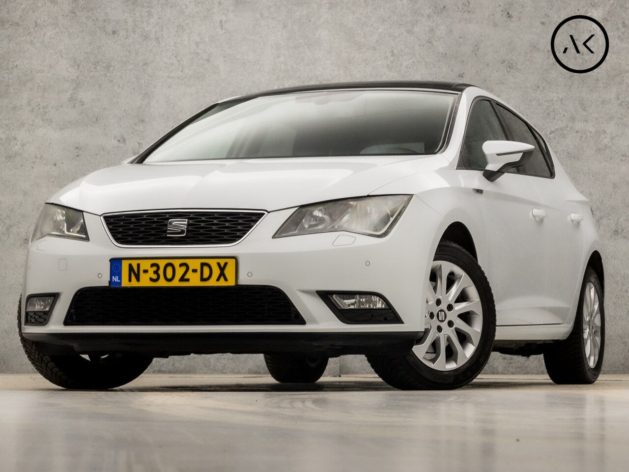 Seat Leon - 1.2 TSI Sport Automaat (SCHUIFDAK, NAVIGATIE, CLIMATE, STOELVERWARMING, GETINT GLAS, SPORT - AutoWereld.nl