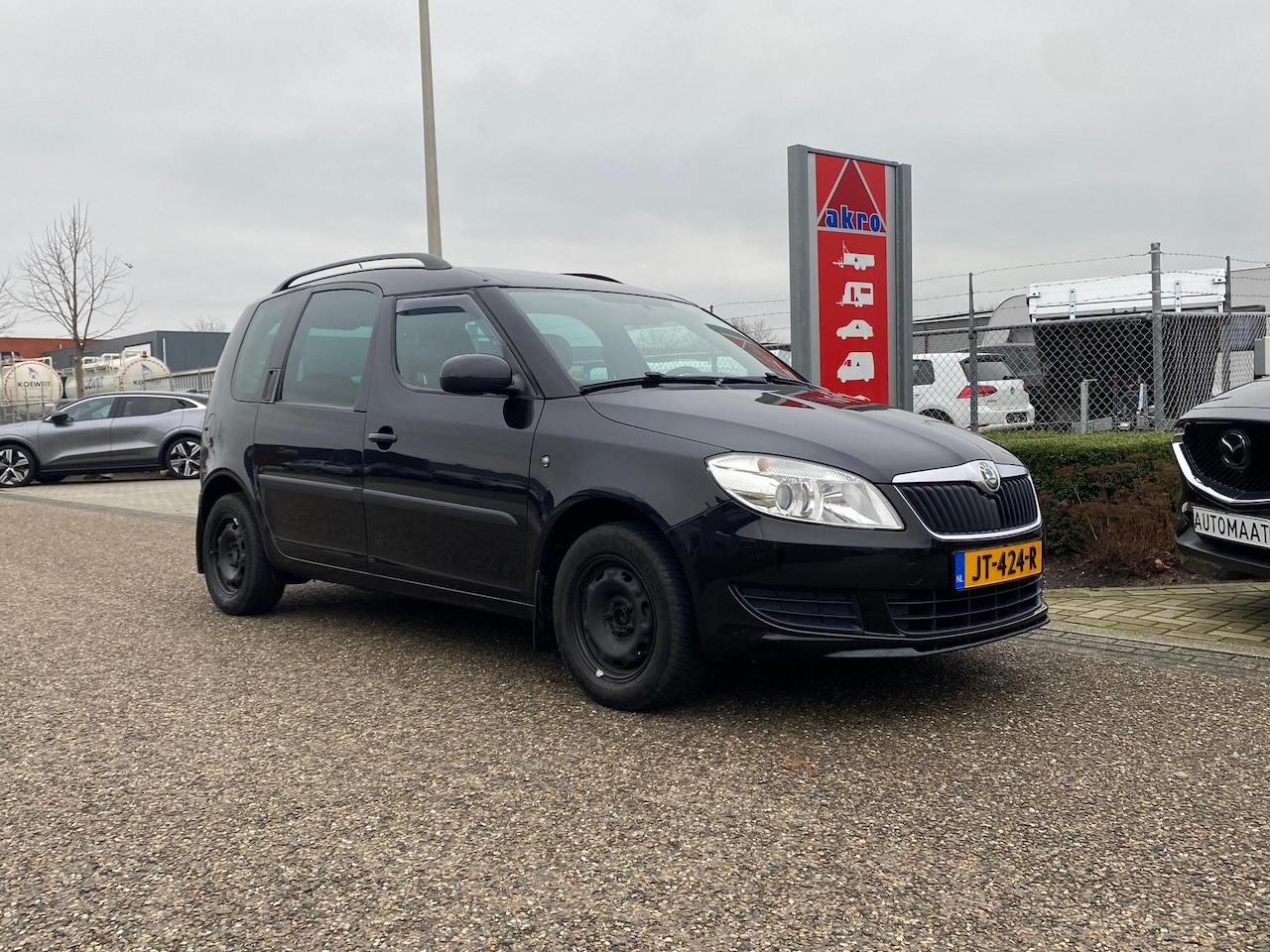 Skoda Roomster - 1.2 Ambition | Parkeersensoren achter | Trekhaak | Airco | Stoelverwarming - AutoWereld.nl