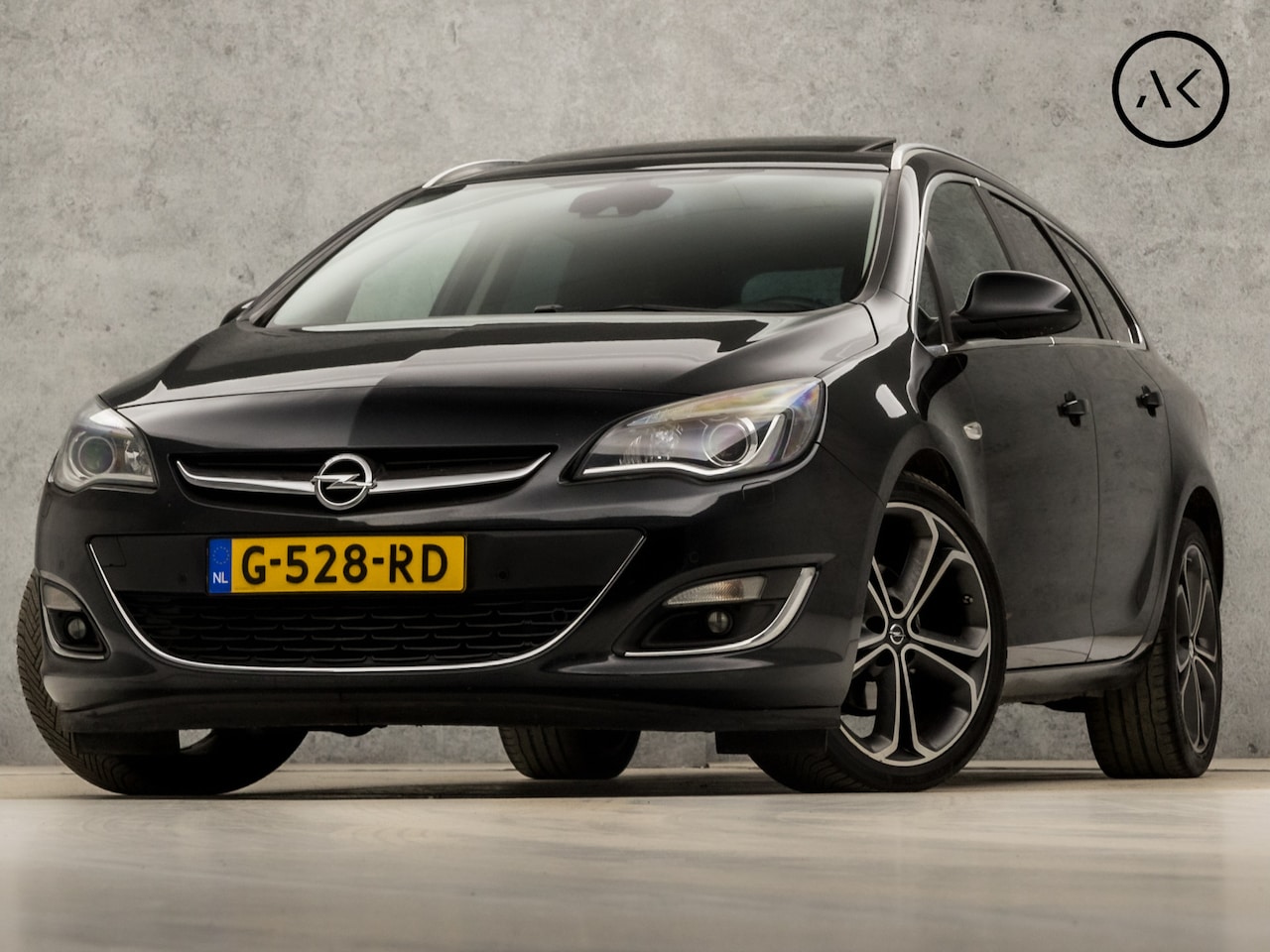 Opel Astra Sports Tourer - 1.6 Turbo Sport 170Pk Automaat (SCHUIFDAK, NAVIGATIE, STUUR/STOELVERWARMING, LEDEREN SPORT - AutoWereld.nl