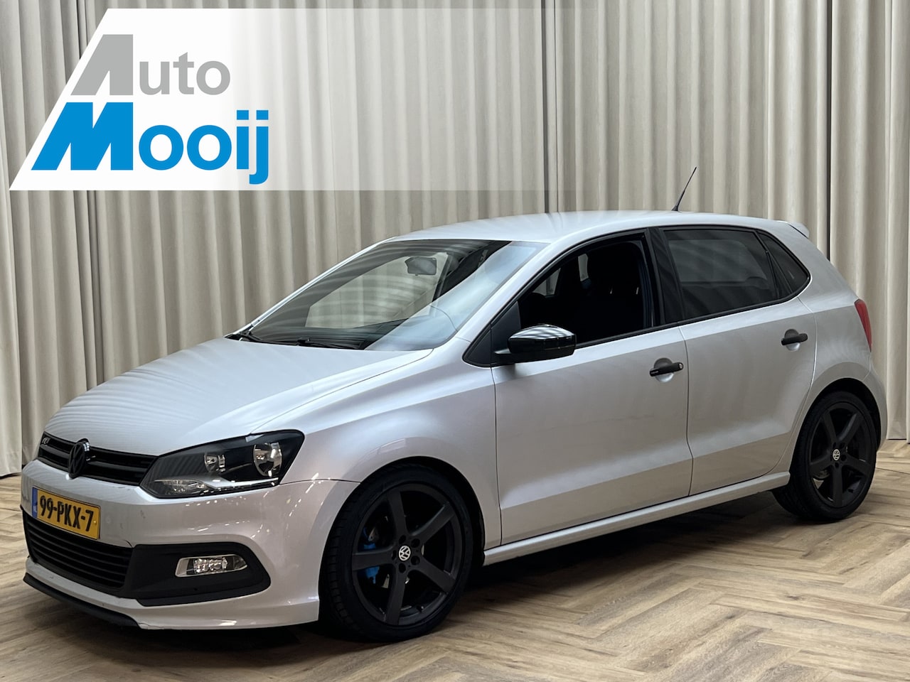 Volkswagen Polo - 1.2 TSI Comfortline R-Line Look *Klep-uitlaat* / Navi + Camera / Cruise / PDC / 17'' LMV / - AutoWereld.nl