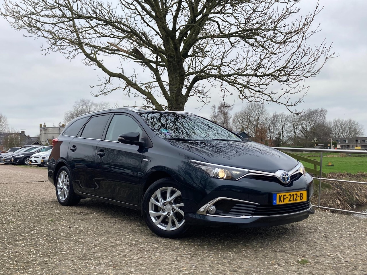 Toyota Auris Touring Sports - 1.8 Hybrid Executive | Cruise + Clima + Navi nu € 11.975,-!!! - AutoWereld.nl