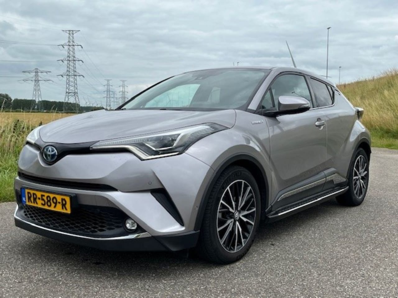 Toyota C-HR - 1.8 Hybrid Style Full options - AutoWereld.nl