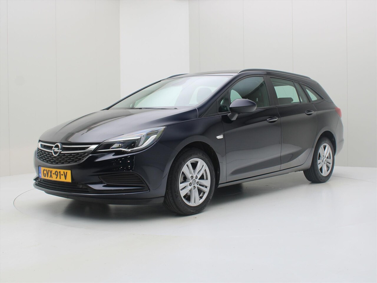 Opel Astra Sports Tourer - 1.0 Turbo 106pk Edition Business [ AIRCO+CRUISECONTROL+CARPLAY+NAVIGATIE+LMV+PDC ] - AutoWereld.nl