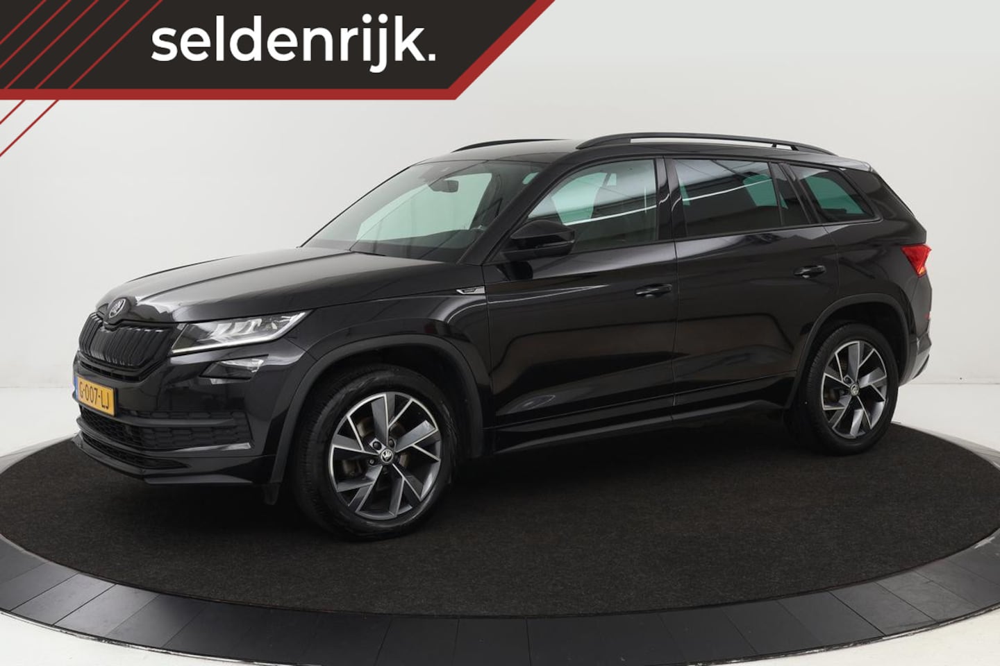 Skoda Kodiaq - 1.5 TSI Sportline | Stoelverwarming | Adaptive cruise | Leder/Alcantara | Canton Sound | C - AutoWereld.nl