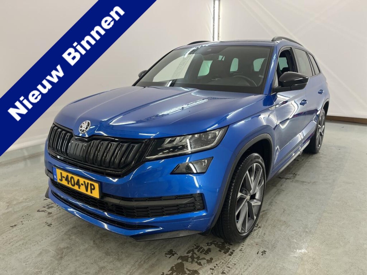 Skoda Kodiaq - 1.5 TSI DSG Sportline Business Afn.trekhaak - 20Inch LMV - Canton Audio - Blindspot detect - AutoWereld.nl