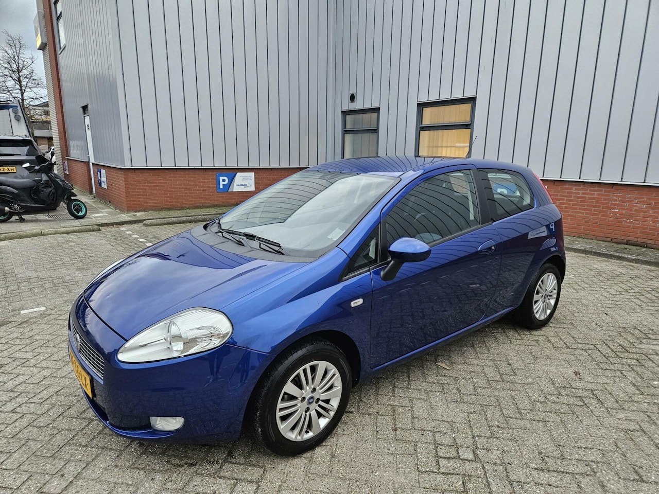 Fiat Grande Punto - 1.4 NAP/Cruise/Climate - AutoWereld.nl