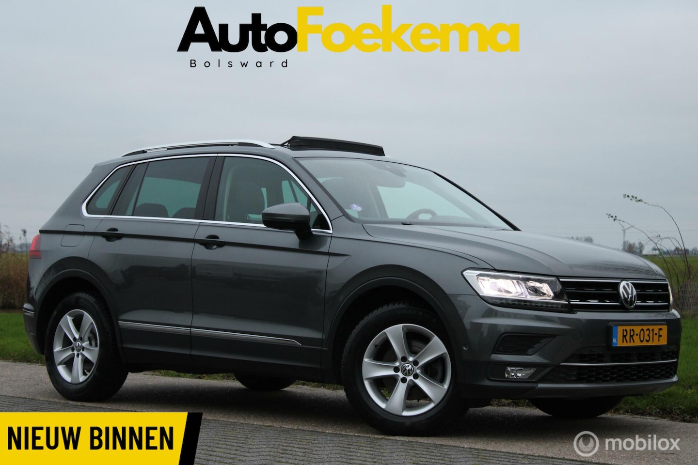 Volkswagen Tiguan - 1.4 TSI ACT Highline LED ADAP CRUISE PANO TREKHAAK WEGKLAPBAAR - AutoWereld.nl