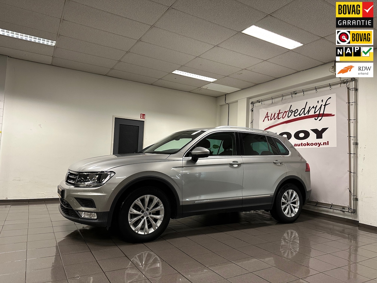 Volkswagen Tiguan - 1.4 TSI Comfortline * 1e Eig / Dealer onderhouden / Navigatie / Cruise control / NL Auto * - AutoWereld.nl