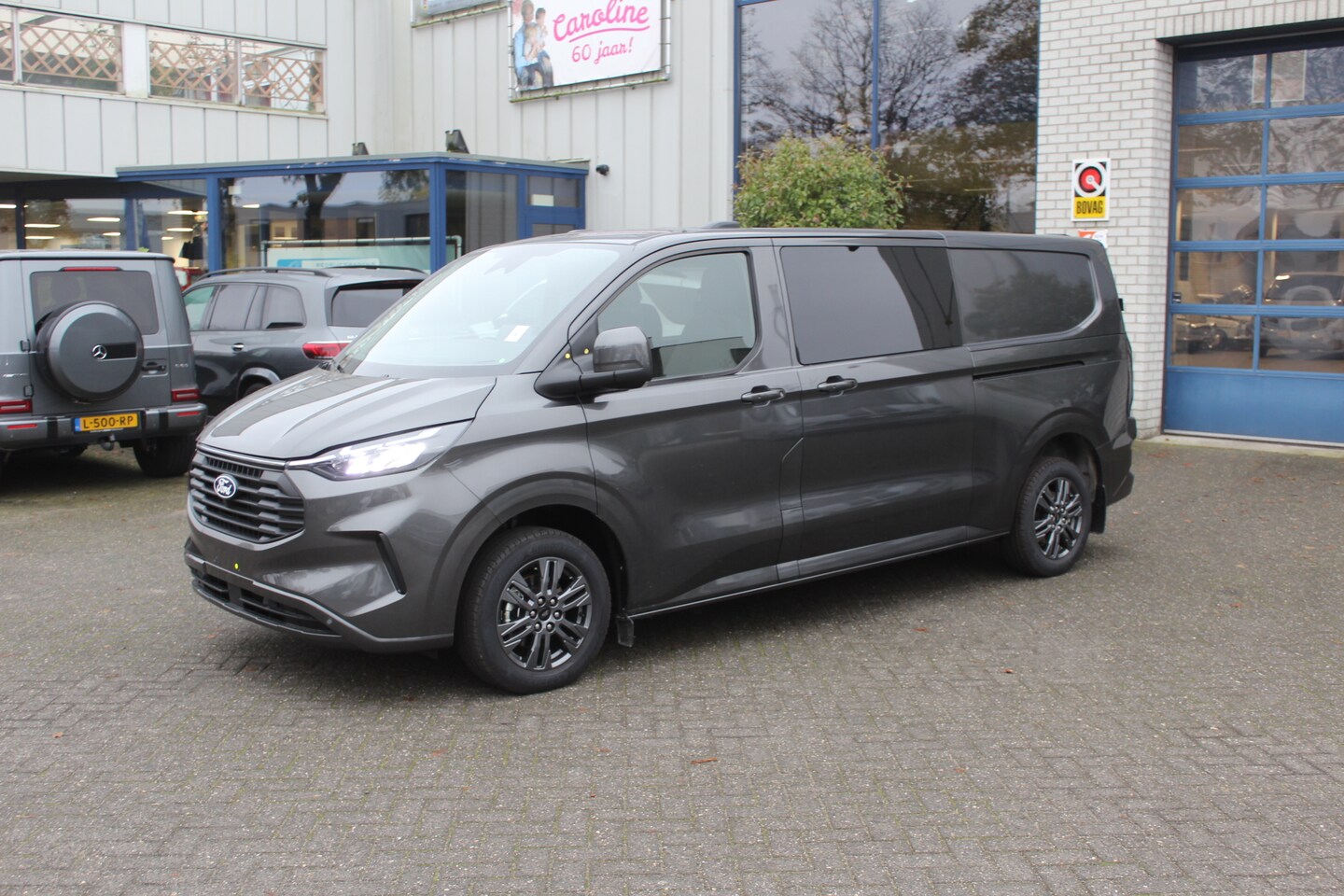 Ford Transit Custom - 300L 2.0 TDCI L2H1 Limited DC Driver Assistance Pack Premium, Middenconsole, Inklapbare tr - AutoWereld.nl