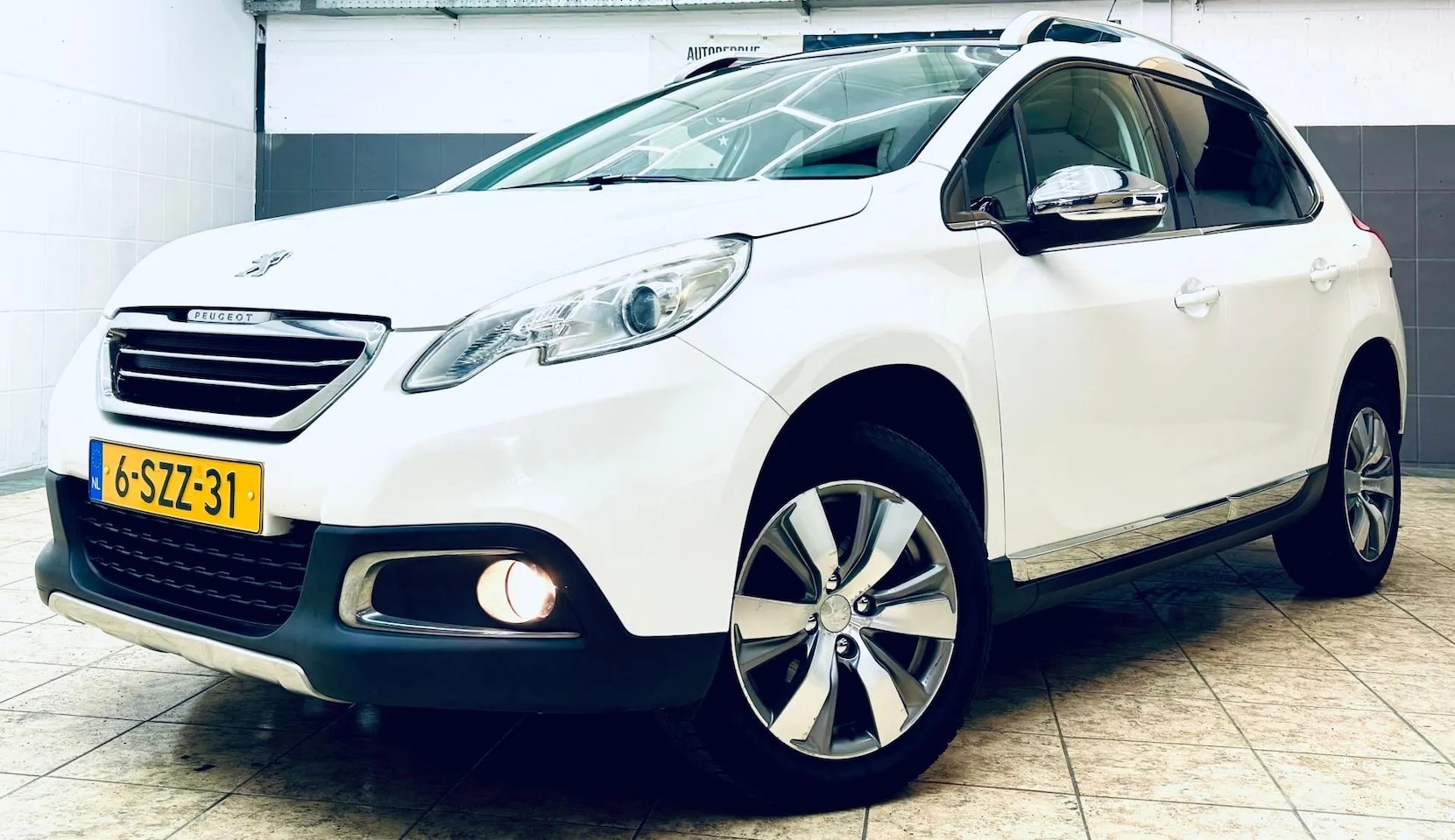 Peugeot 2008 - 1.2 VTi Allure P.P Plus - AutoWereld.nl