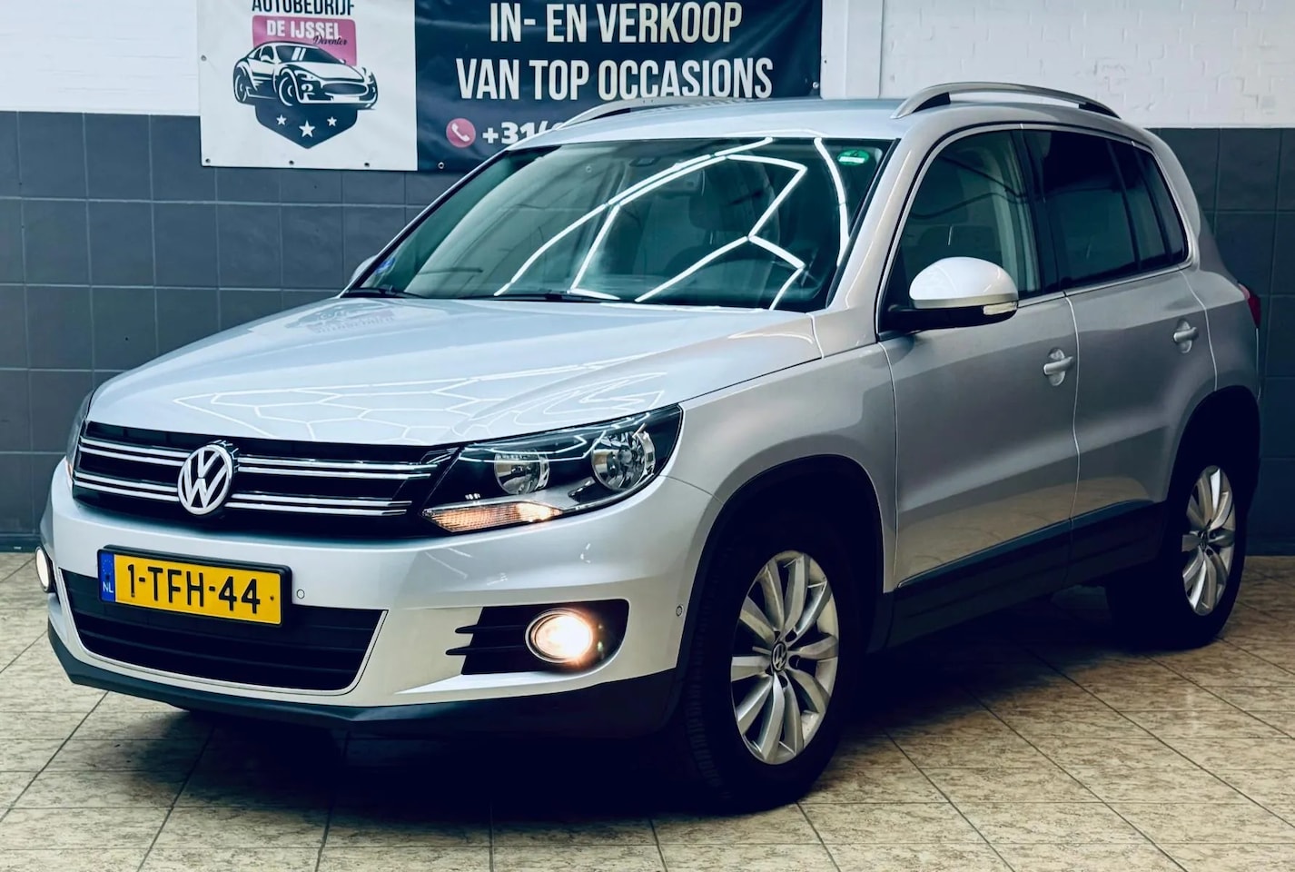 Volkswagen Tiguan - 1.4 TSI Sport&Style - AutoWereld.nl