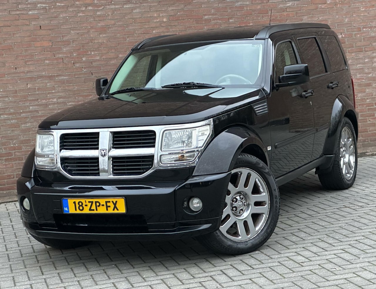 Dodge Nitro - 3.7 V6 SXT LPG/G3 - Leder - Navi - 4X4 - Trekhaak - 20 Inch - AutoWereld.nl