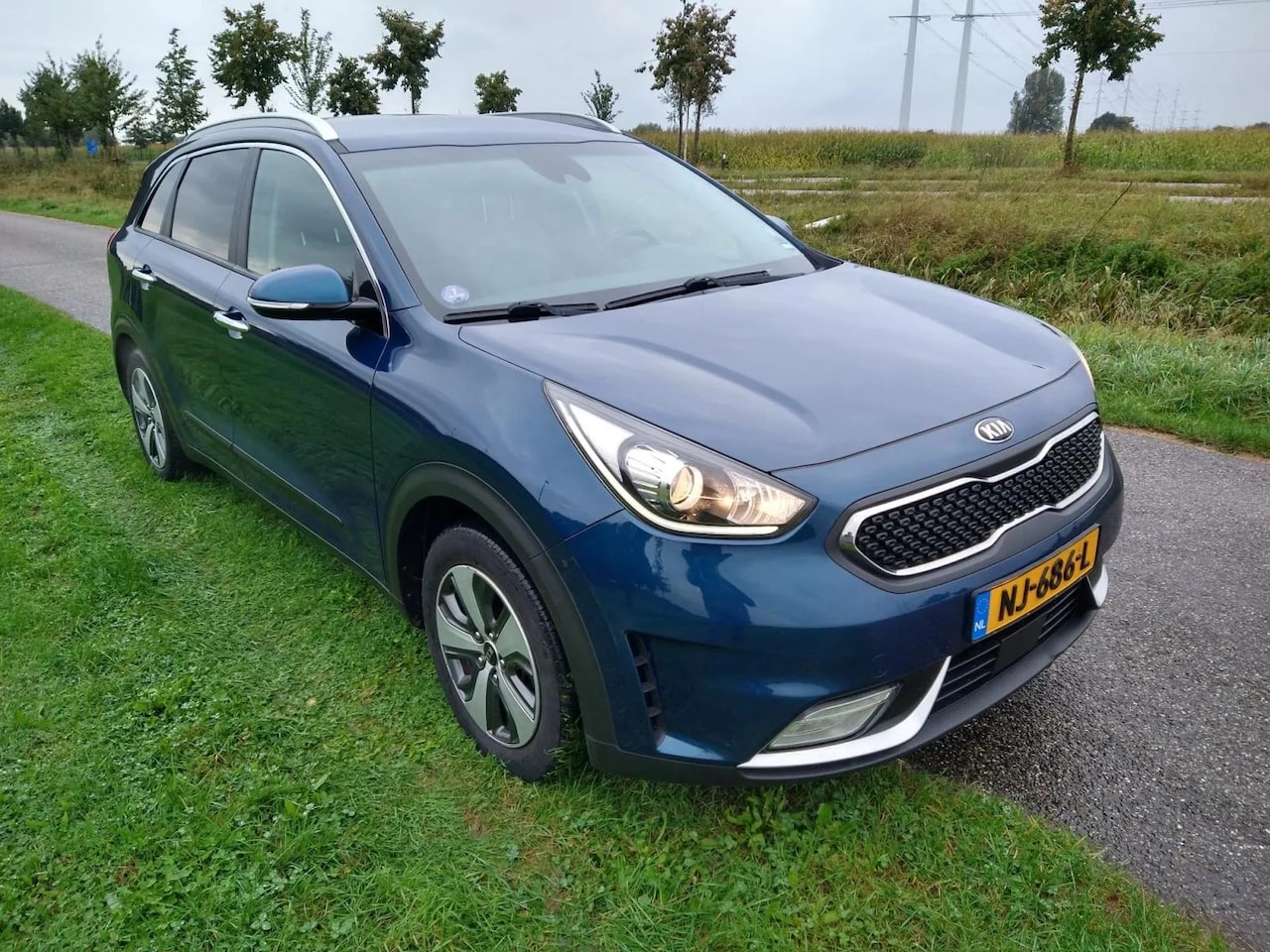 Kia Niro - 1.6 GDi Hybrid BusinessLine 1.6 GDi Hybrid BusinessLine - AutoWereld.nl