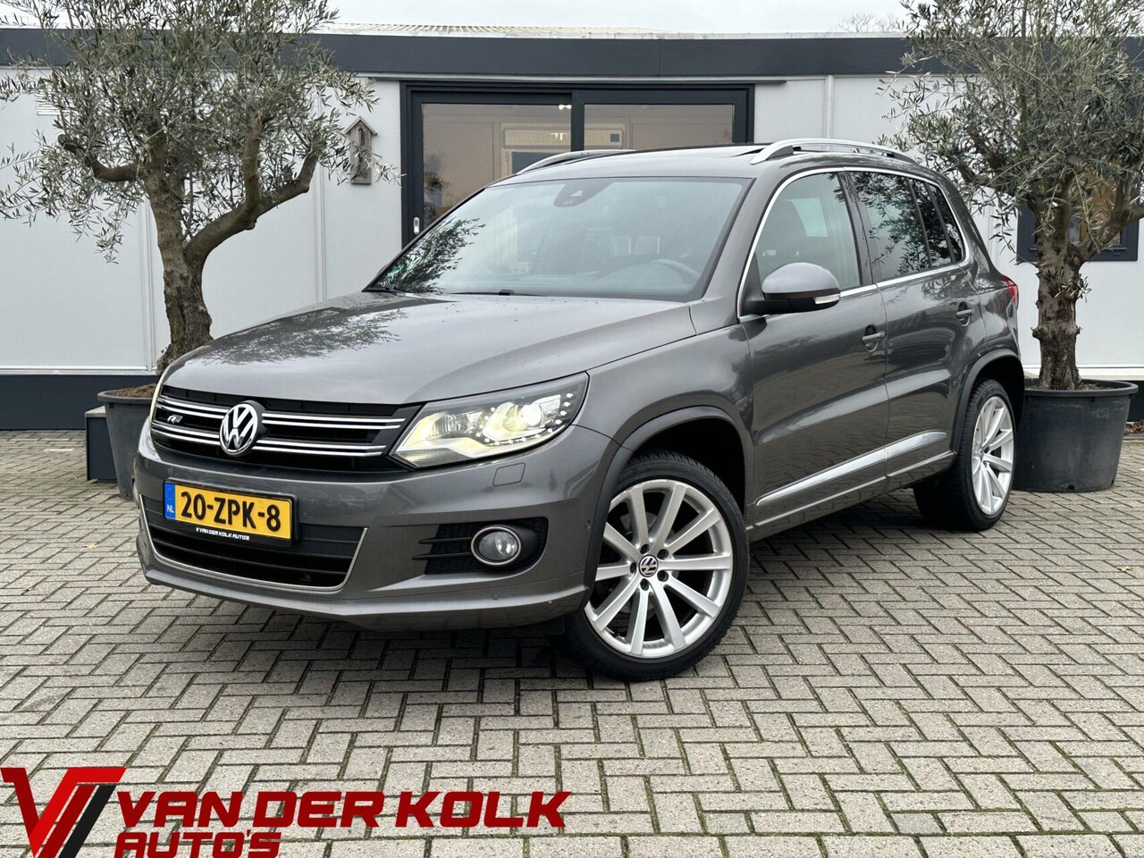 Volkswagen Tiguan - 1.4 TSI R-Line Panorama Xenon Navi ParkAssist Cruise Climate Trekhaak - AutoWereld.nl