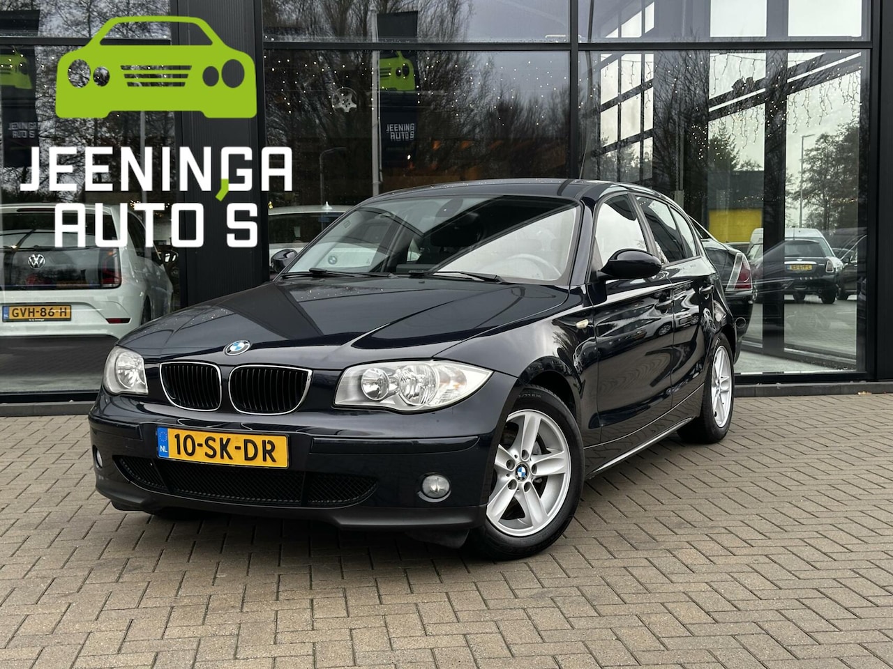 BMW 1-serie - 118i High Executive | PDC | Clima | Navi - AutoWereld.nl