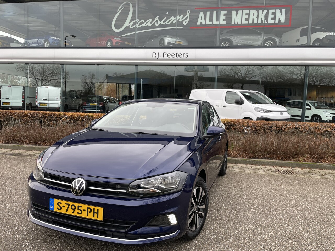 Volkswagen Polo - 1.0 TSI Comfortline Business Clim. control - Cruise control Adaptive - Parkeer sensoren V+ - AutoWereld.nl