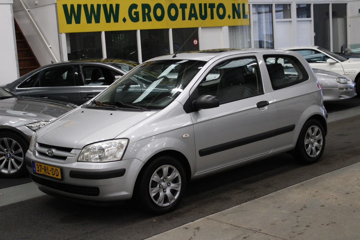 Hyundai Getz - 1.1i Active Sky Elektr. Schuif-/Kanteldak, Stuurbekrachtiging - AutoWereld.nl