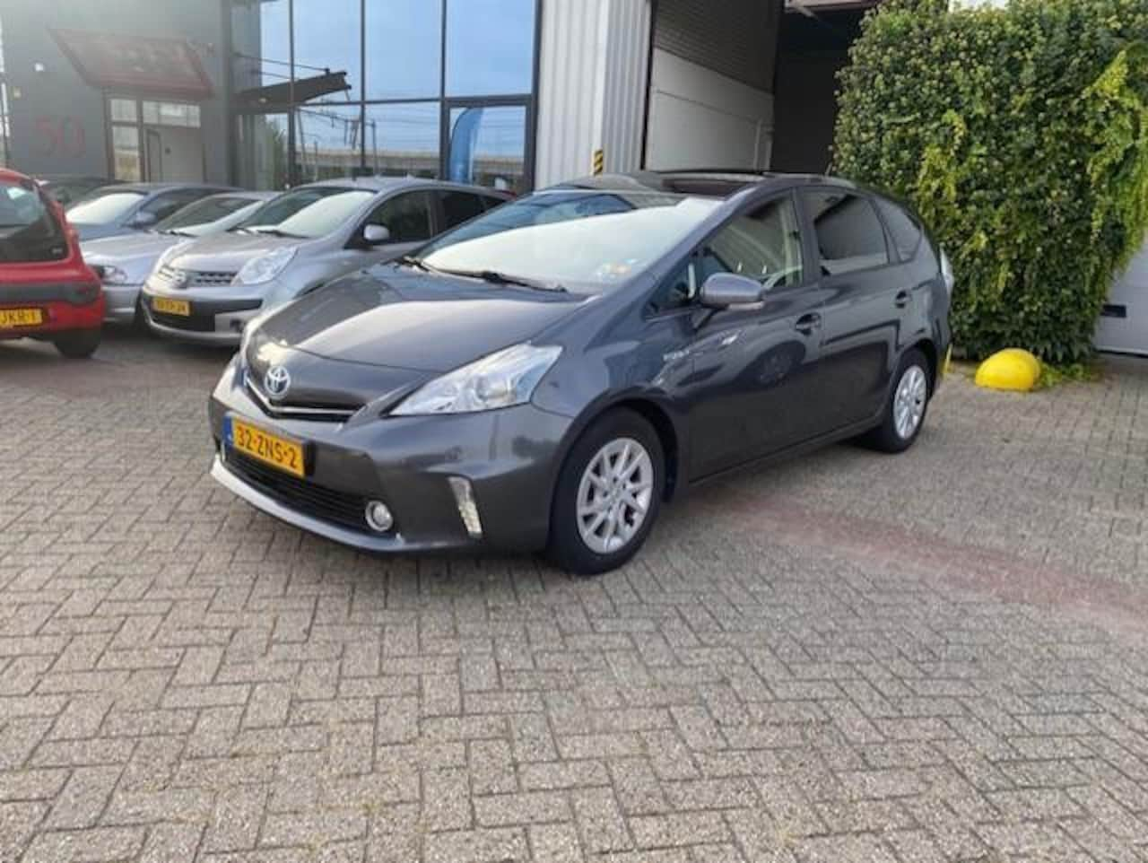 Toyota Prius Wagon - 1.8  Aspiration 1.8 Aspiration ,PANODAK,CRUIS,AUX,NAVI , inruil mog. - AutoWereld.nl