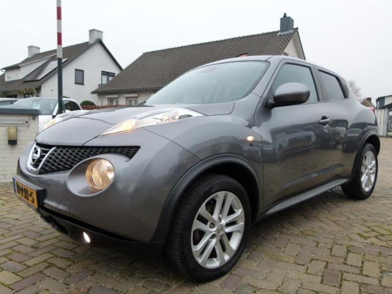 Nissan Juke - 1.6 Tekna 1.6 Tekna, LMV, NAVI, CC, CLIMA - AutoWereld.nl