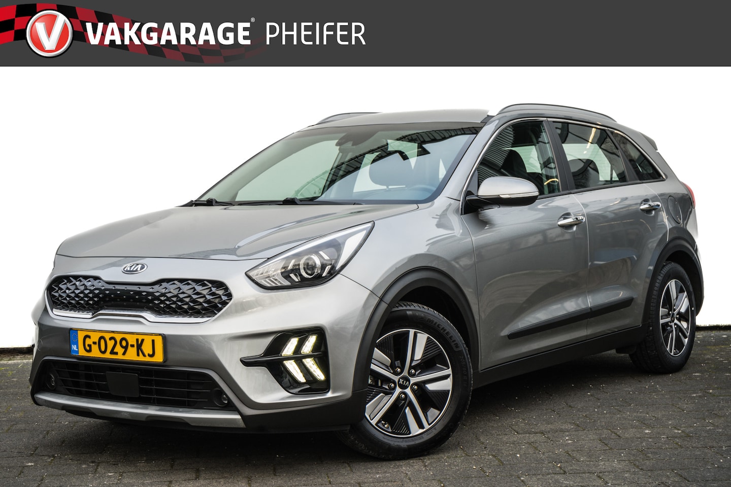 Kia Niro - 1.6 GDi Hybrid DynamicLine Trekhaak/ Navigatie/ Carplay/ Camera/ Lmv/ Half leer/ Adapt. cr - AutoWereld.nl