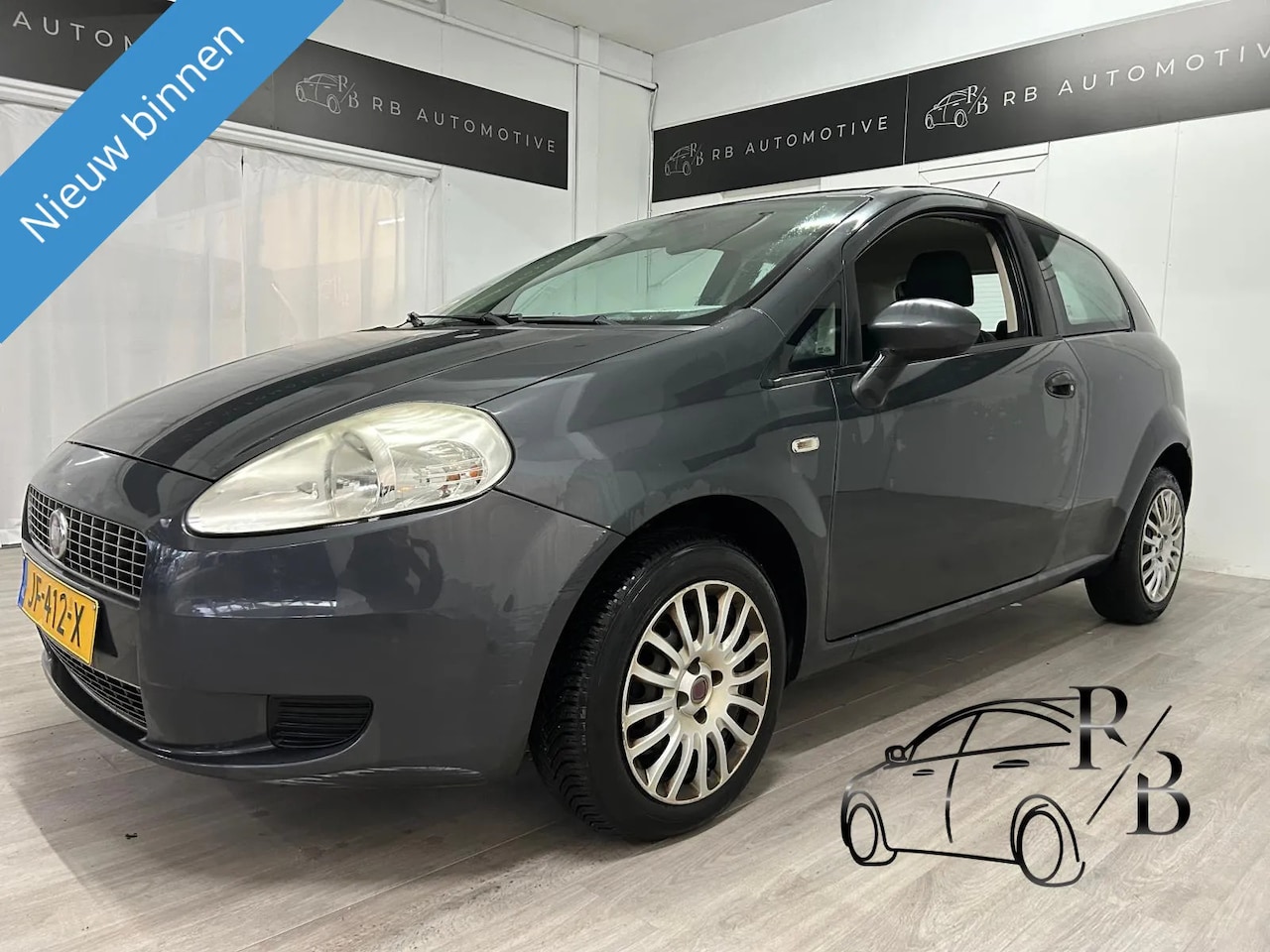 Fiat Grande Punto - 1.2 Racing 1.2 Racing - AutoWereld.nl