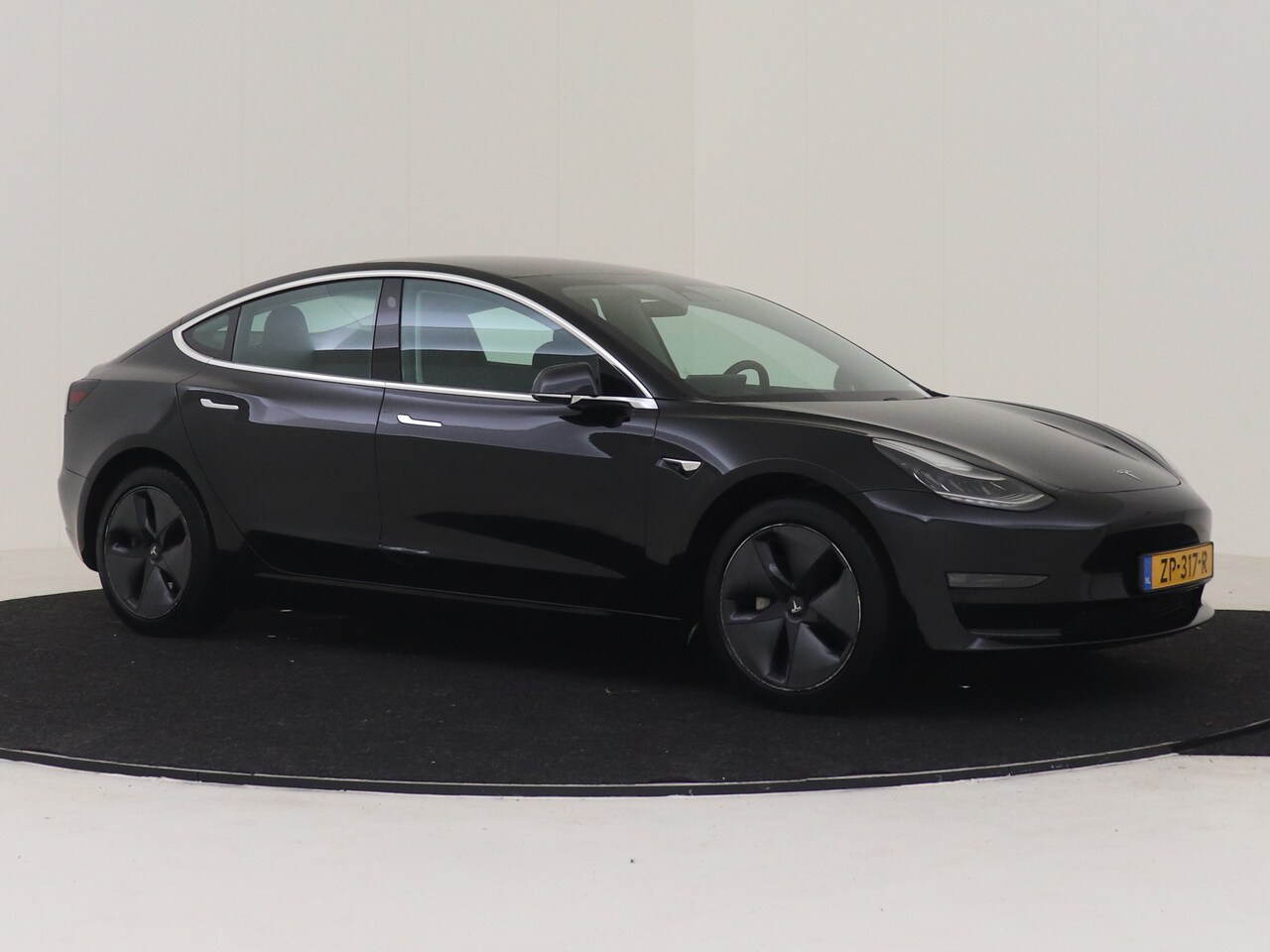 Tesla Model 3 - Long Range RWD Long Range AWD 75 kWh PREMIUM AUDIO TREKHAAK PANORAMADAK AUTOPILOT ZWART LEDER 360 CAMERA - AutoWereld.nl