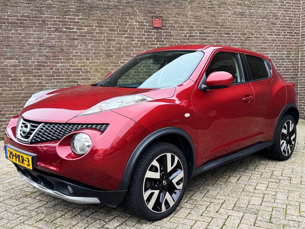 Nissan Juke - 1.6 Acenta Clima Trekhaak Parkeersensoren NAP 18-Inch Cruise-Contr - AutoWereld.nl