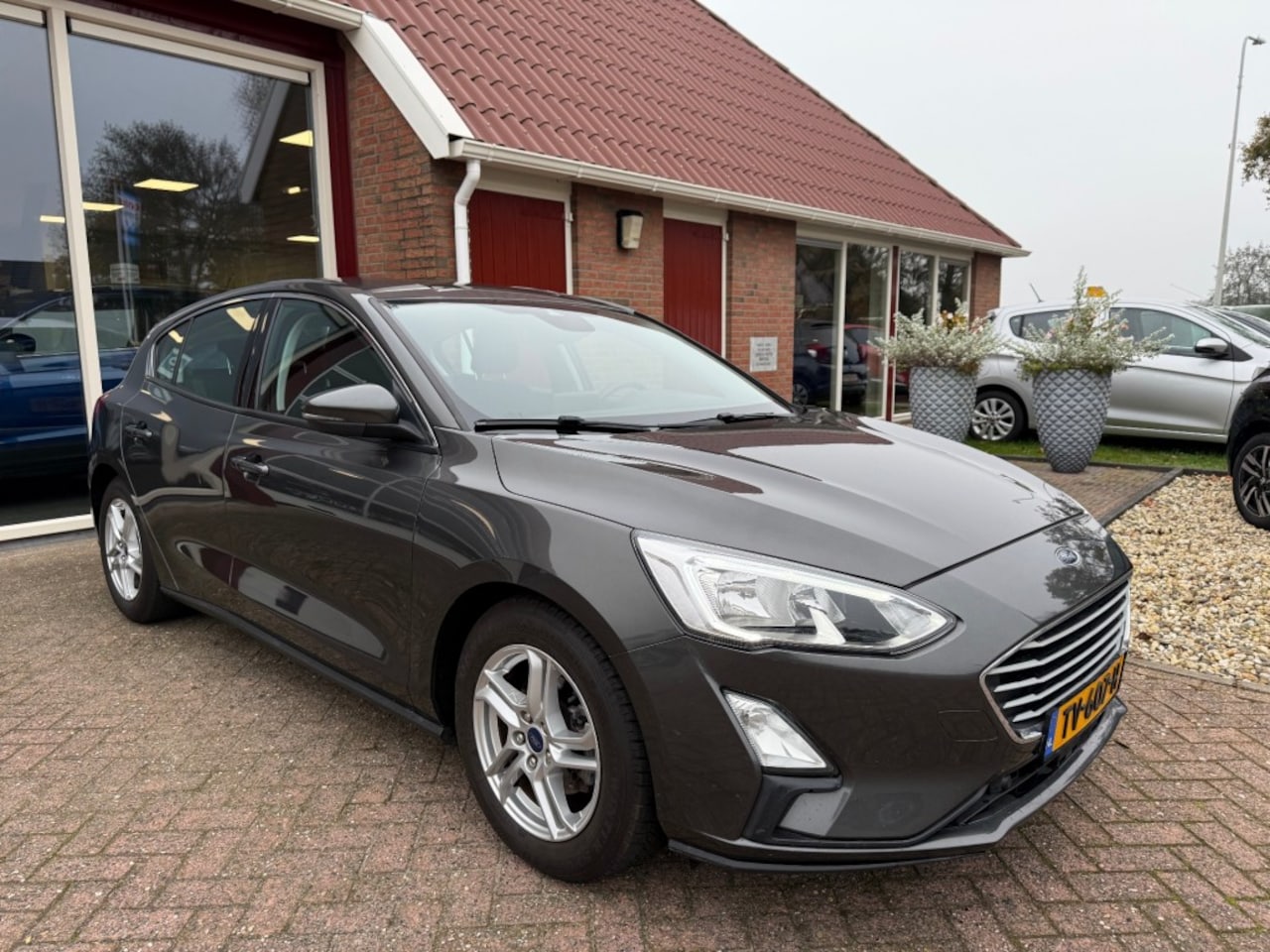 Ford Focus - 1.0 ECOBOOST TREND EDITION BUSINESS 5-DRS AIRCO/NAVI/CR - AutoWereld.nl