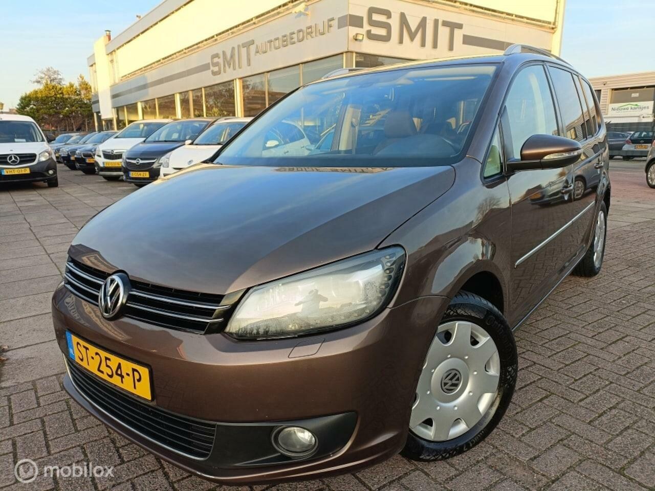 Volkswagen Touran - 1.4 TSI Highline 7P/Xenon/Nav/PDC/Led - AutoWereld.nl