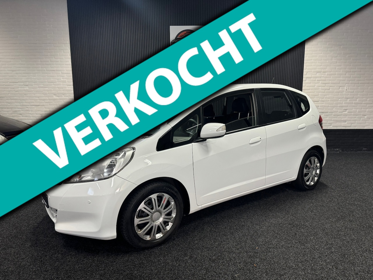 Honda Jazz - 1.4 Exclusive AUTOMAAT, AIRCO,ELEK PAKKET NW APK PDC VOOR ACHTER - AutoWereld.nl