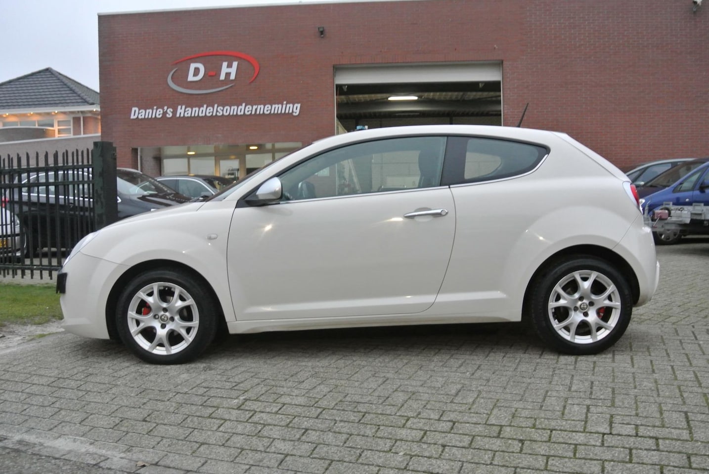 Alfa Romeo MiTo - 1.4 Distinctive airco inruil mogelijk nap - AutoWereld.nl