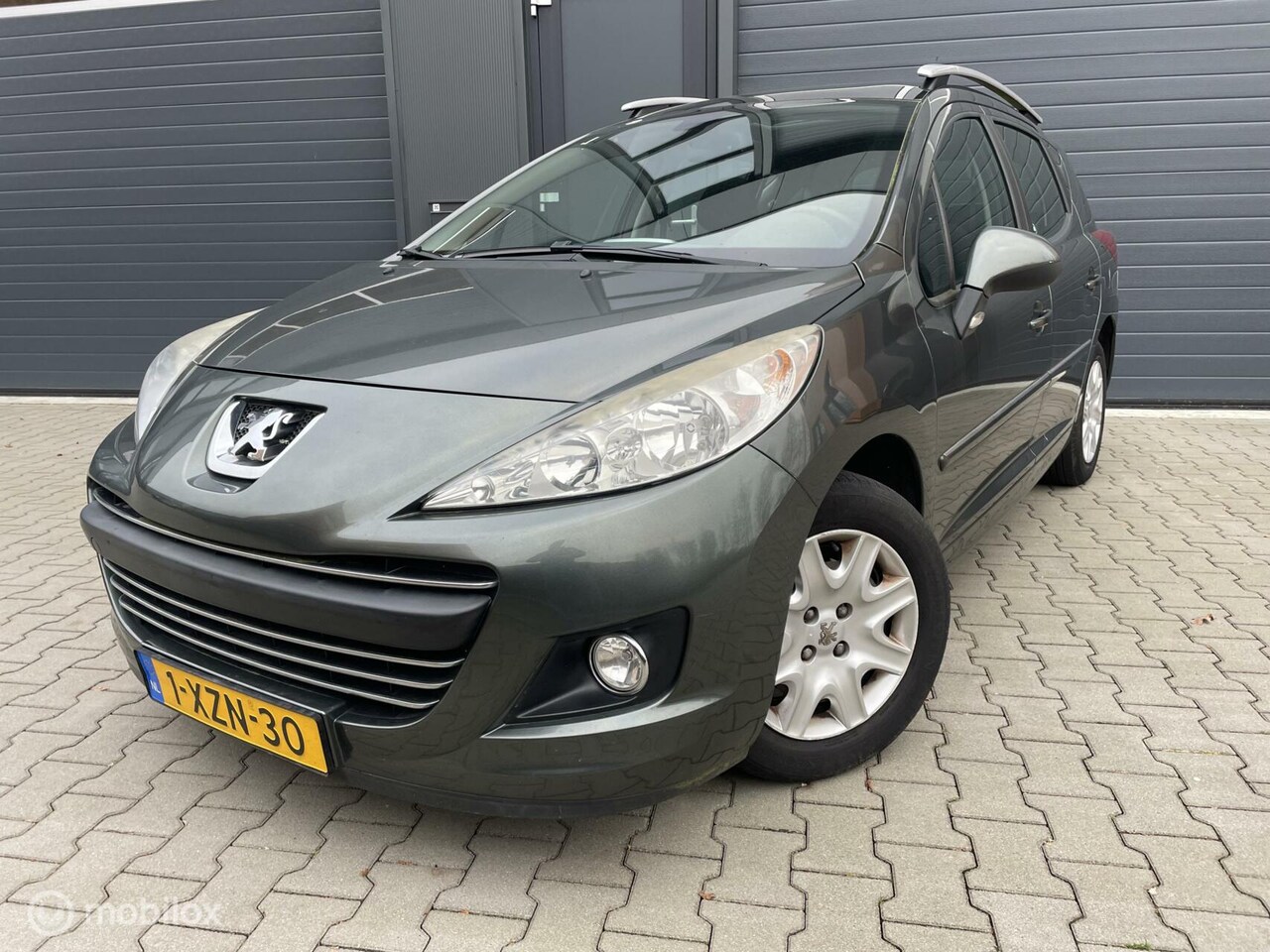 Peugeot 207 SW - 1.4 VTi XS..Glazen-dak,Trekhaak,74.000km! - AutoWereld.nl