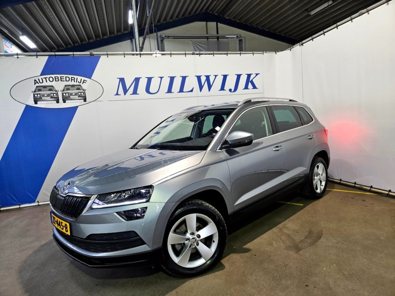 Skoda Karoq - 1.0 TSI Business Edition / Trekhaak / Full LED / NL Auto - AutoWereld.nl