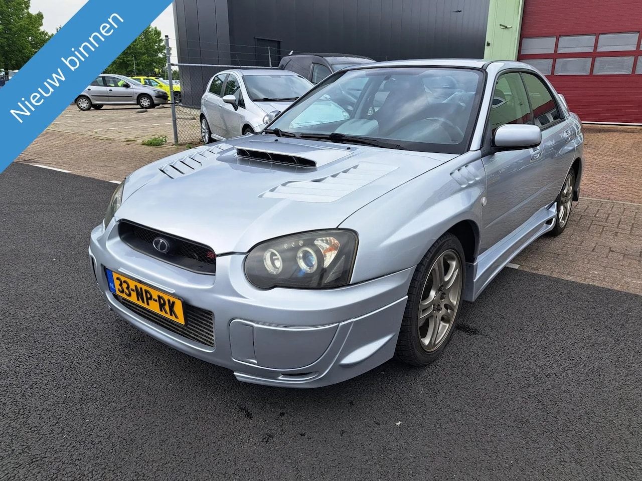 Subaru Impreza - 2.0 WRX AWD Sti Look 280pk Youngtimer - AutoWereld.nl