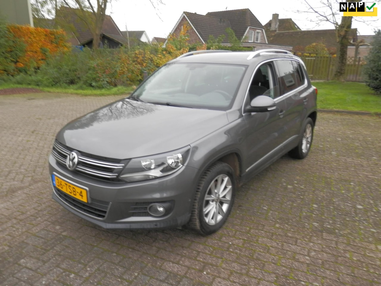 Volkswagen Tiguan - 1.4 TSI Sport&Style airco navi - AutoWereld.nl