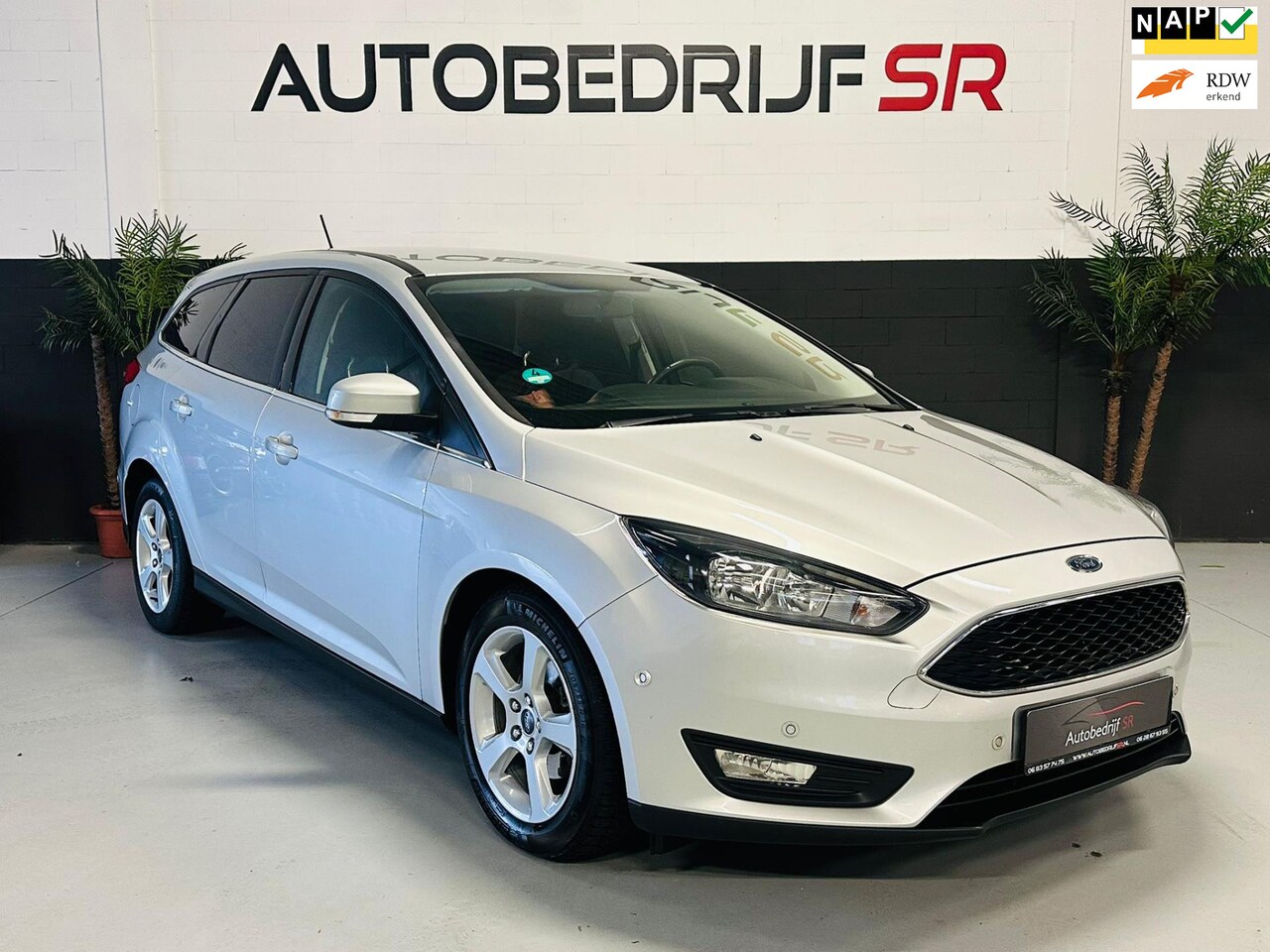 Ford Focus Wagon - 1.0 Titanium Achteruitrijcamera! Navigatie! Cruise Controle! Stoelverwarming! Vol opties! - AutoWereld.nl