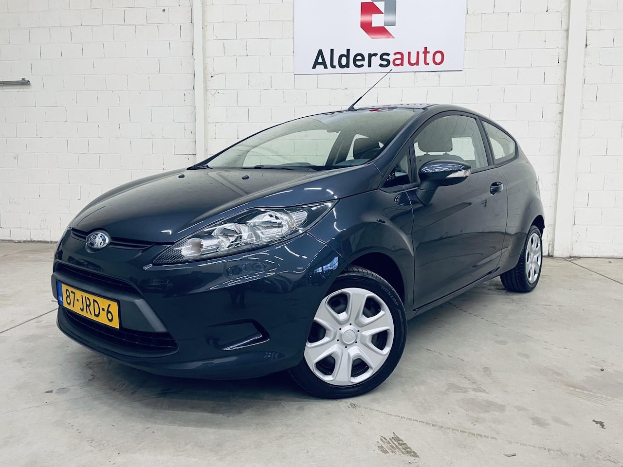 Ford Fiesta - 1.25 Limited Cruise Control Airco Aux - AutoWereld.nl