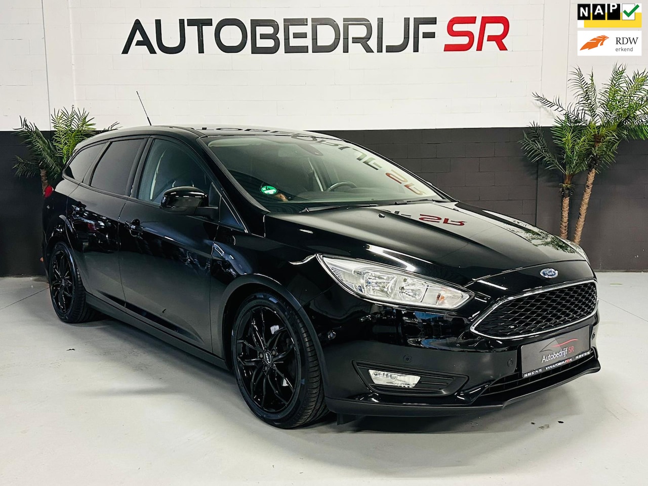 Ford Focus Wagon - 1.0 Titanium Cruise controle! Stoelverwarming! Navigatie! Stuurverwarming! Vol opties - AutoWereld.nl